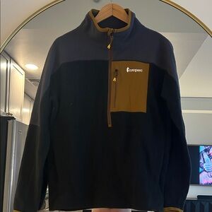 Cotopaxi Black and Brown Jacket with Yellow Accents